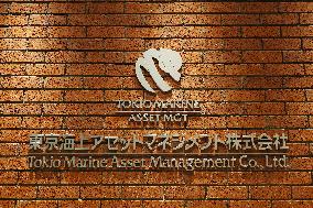 Tokyo Marine Asset Management signboard and logo